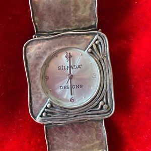 Silpada, sterling Silver retired watch with a safety clasp.